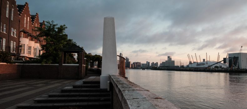 The Thames at dusk from the Greenwich waterfront with The O2 arena, venue of the British Podcast Awards 2026, in the distance